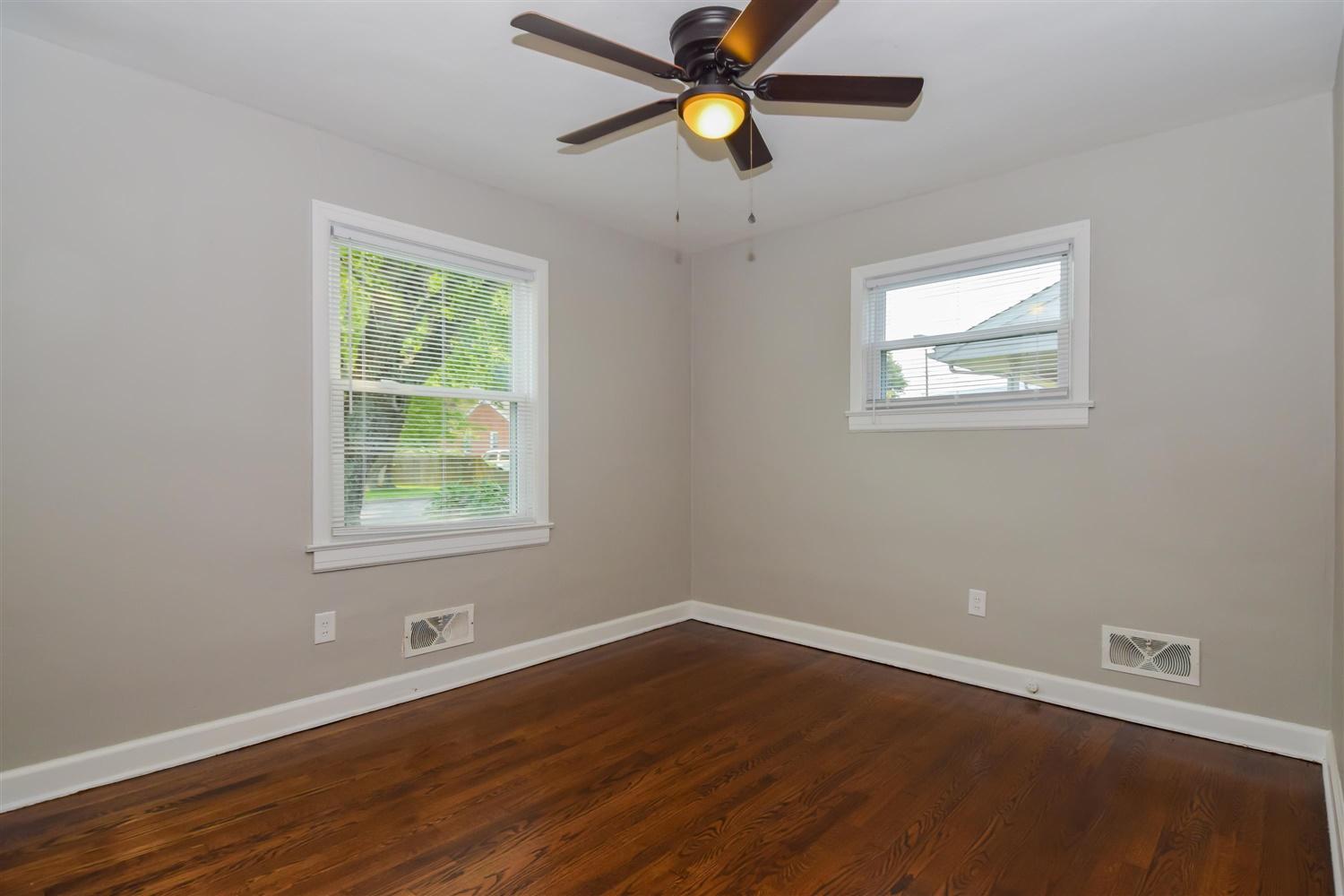 2027 Laura Road Northwest Roanoke, VA 24017 - Photo 9 of 26 a view of an empty room with window and wooden floor