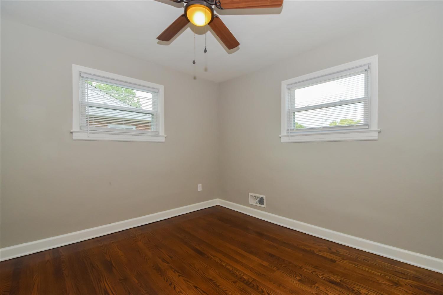 2027 Laura Road Northwest Roanoke, VA 24017 - Photo 10 of 26 wooden floor in an empty room with a window