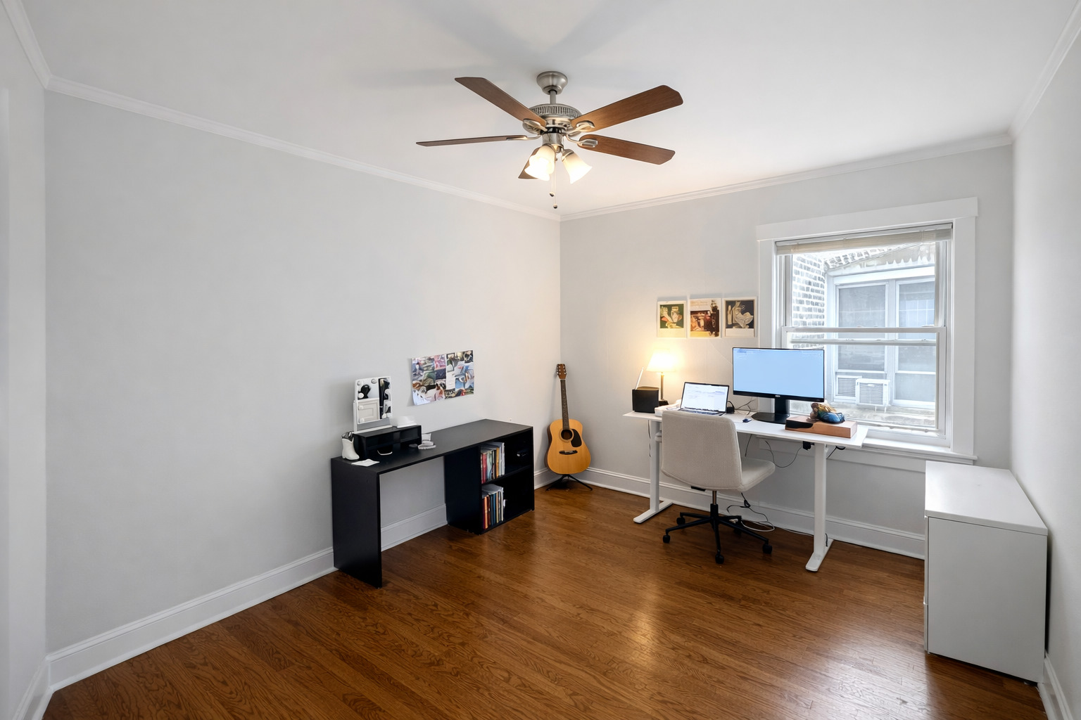 2461 North Clark Street, Unit 2 Chicago, IL 60614 - Photo 7 of 9 a workspace with wooden floor and a window