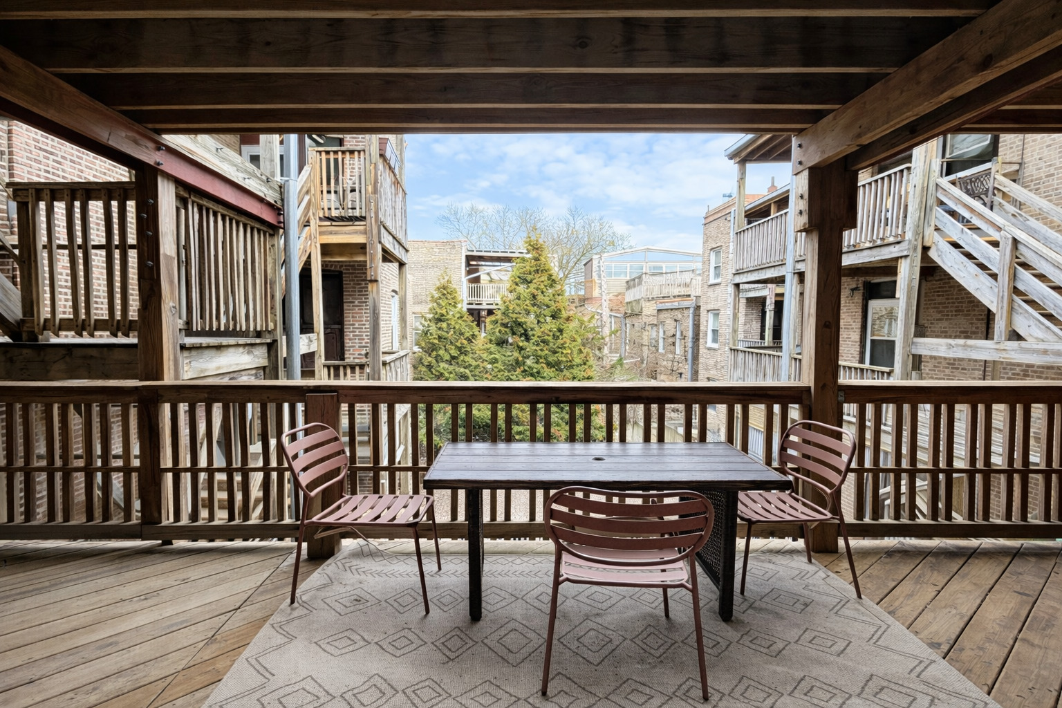 2461 North Clark Street, Unit 2 Chicago, IL 60614 - Photo 9 of 9 a view of a chairs and table in the roof deck