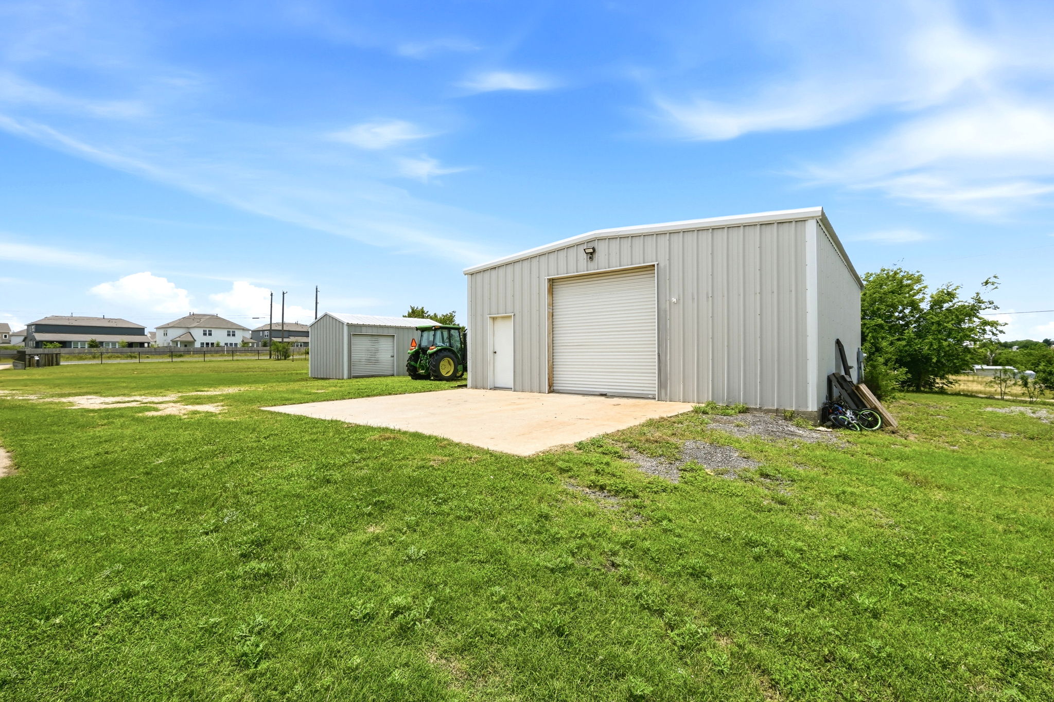 701 County Road 107 Georgetown, TX 78626 - Photo 25 of 30 a view of a house with a yard and garage