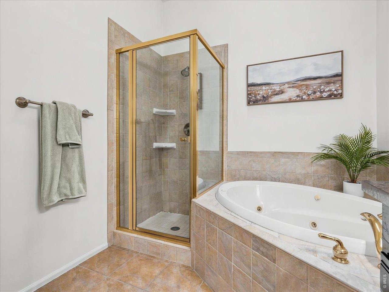 2115 Ranch Drive Denver, CO 80234 - Photo 30 of 50 Huge jetted tub, lots of space in this bathroom too