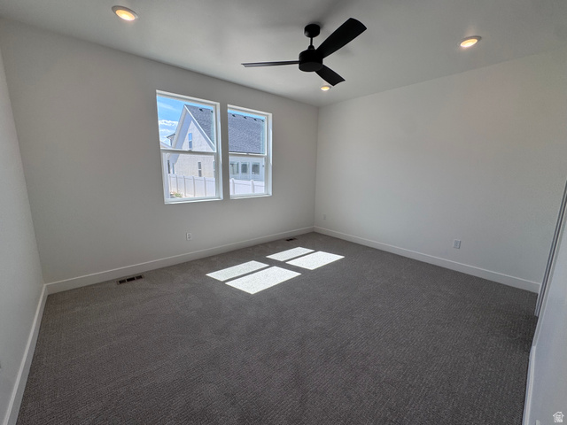 1301 1475 East, Unit 33 Payson, UT 84651 - Photo 7 of 10 Bright room featuring two windows, recessed lighting, and a ceiling fan