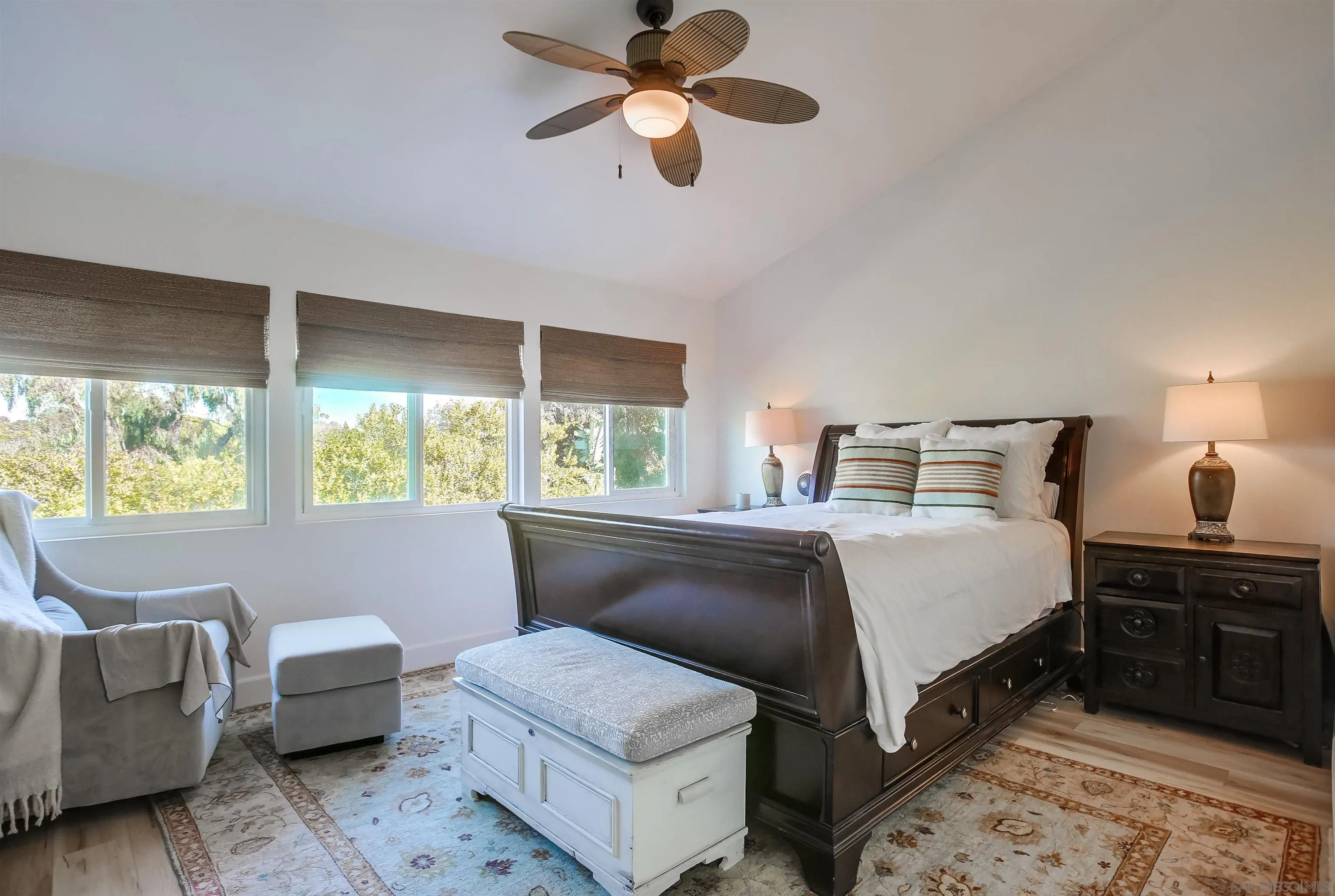 1709 Kennington Road Encinitas, CA 92024 - Photo 11 of 25 a bedroom with a bed and a couch