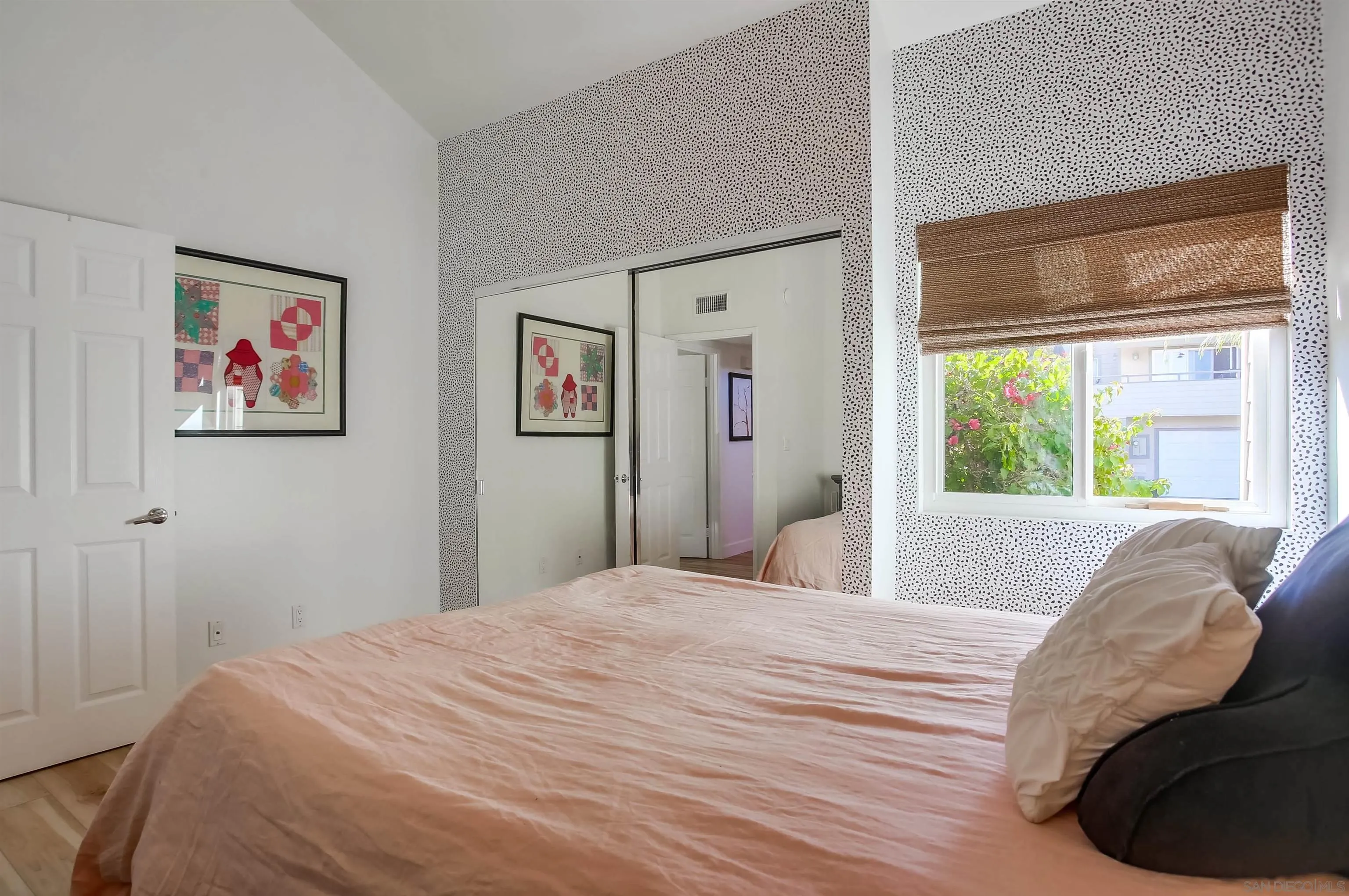 1709 Kennington Road Encinitas, CA 92024 - Photo 14 of 25 a bedroom with a bed and a large window