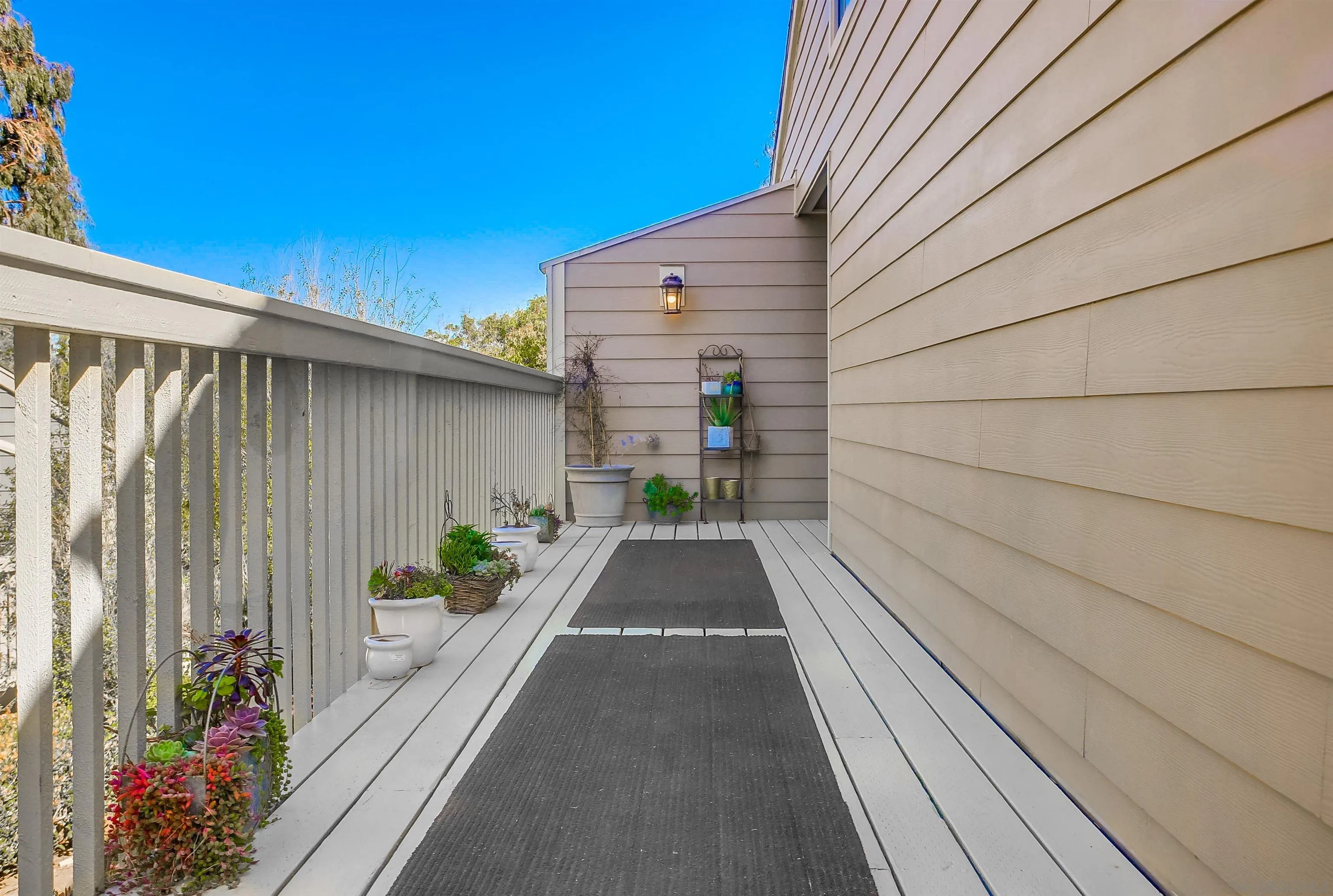 1709 Kennington Road Encinitas, CA 92024 - Photo 22 of 25 a view of a back yard of the house