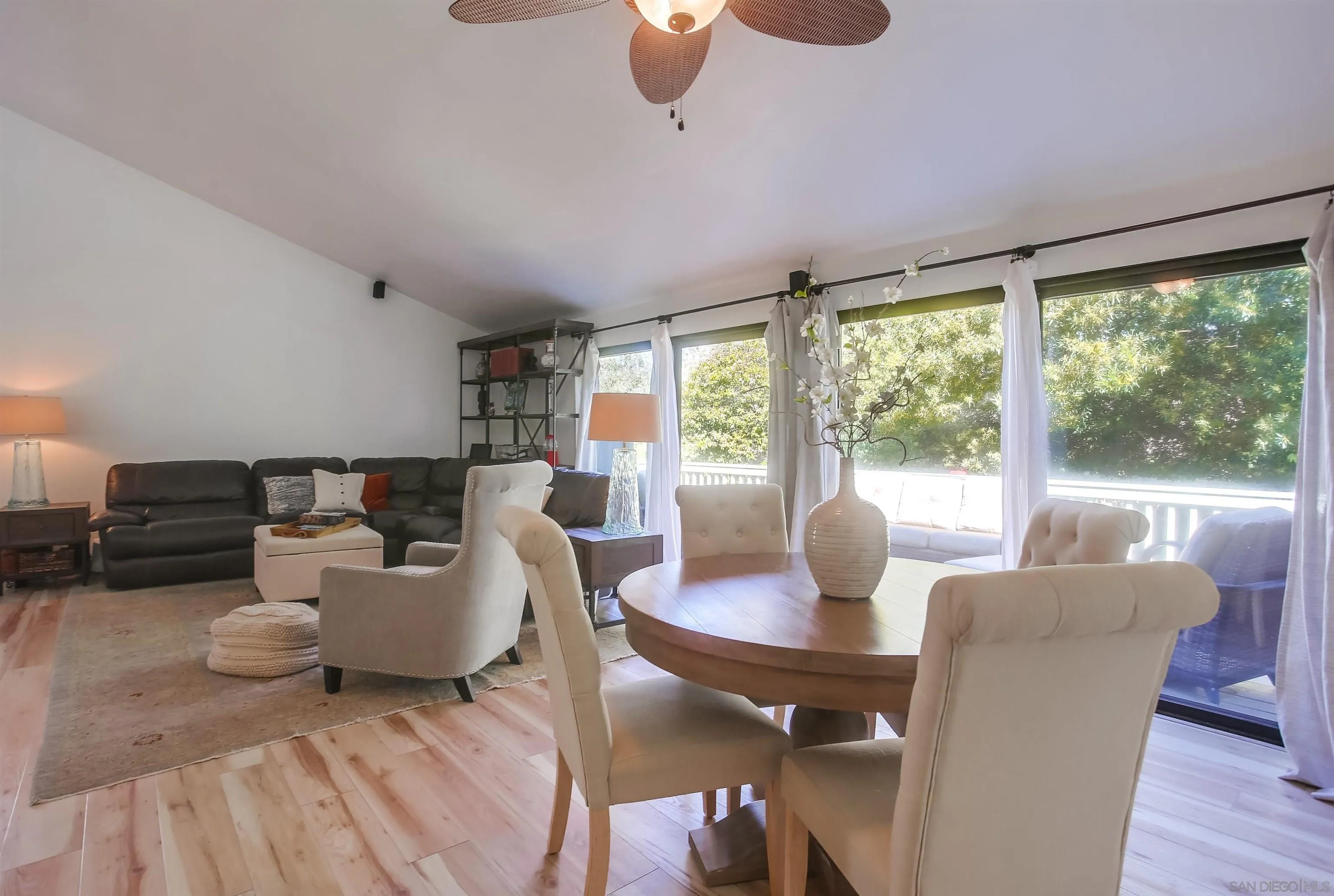 1709 Kennington Road Encinitas, CA 92024 - Photo 8 of 25 a living room with furniture and a window