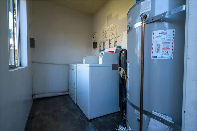 a view of a storage & utility room with washer and dryer