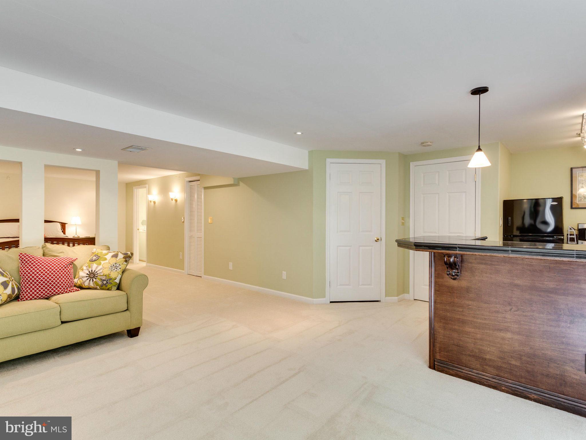 1802 Batten Hollow Road Vienna, VA 22182 - Photo 23 of 30 a view of a livingroom with furniture and a window