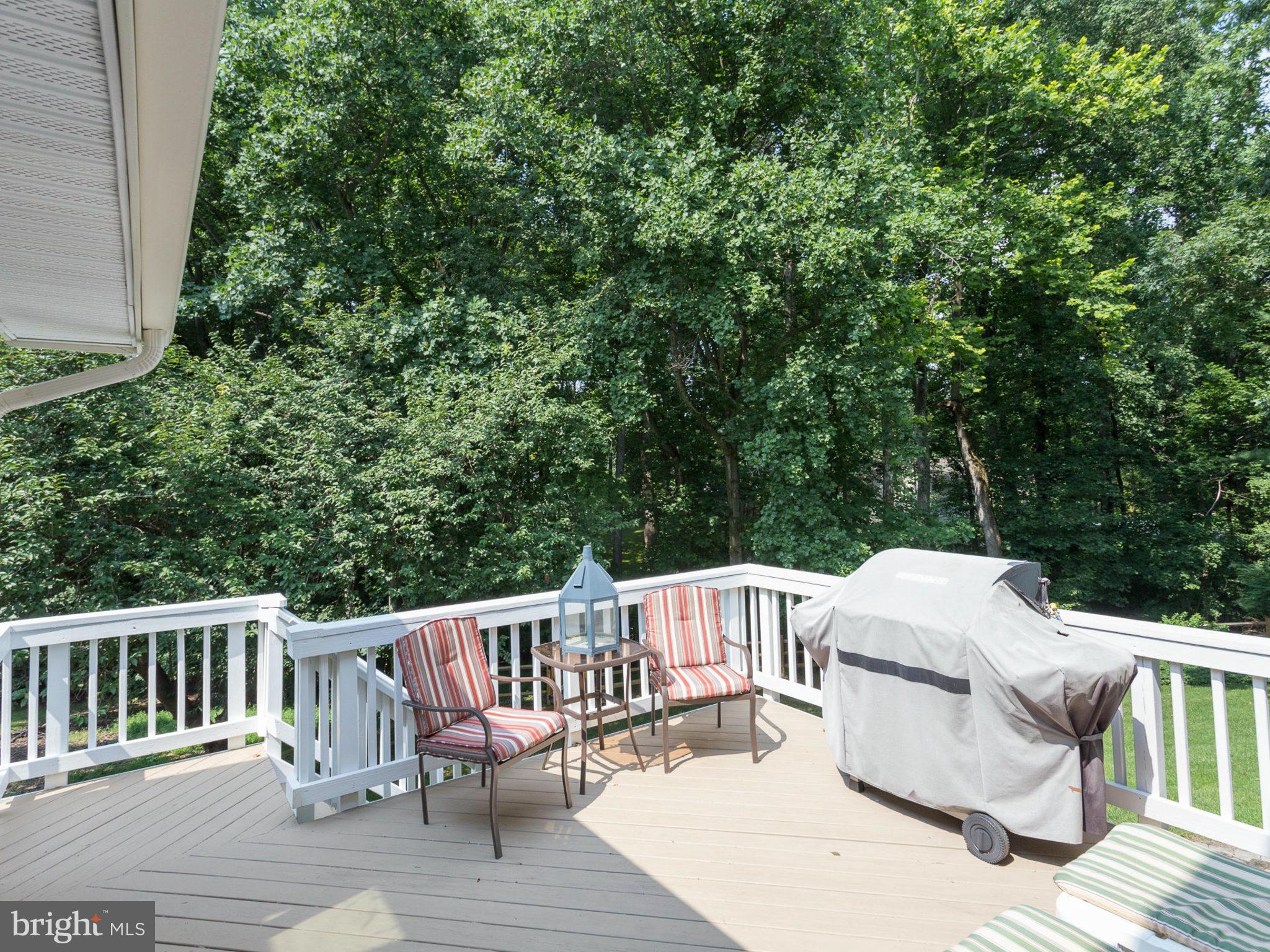 1802 Batten Hollow Road Vienna, VA 22182 - Photo 26 of 30 a view of a deck patio and backyard