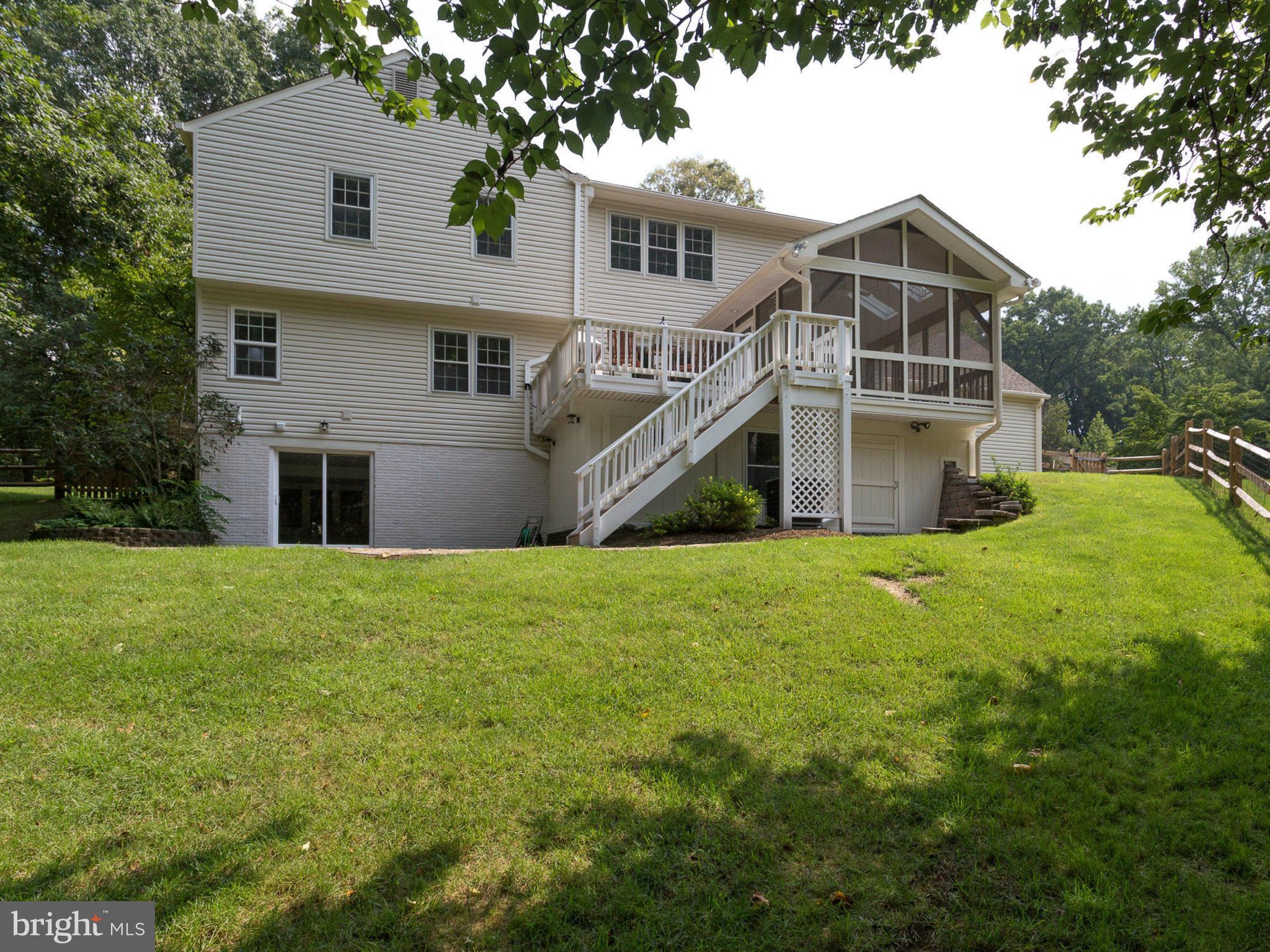 1802 Batten Hollow Road Vienna, VA 22182 - Photo 29 of 30 a front view of a house with a yard