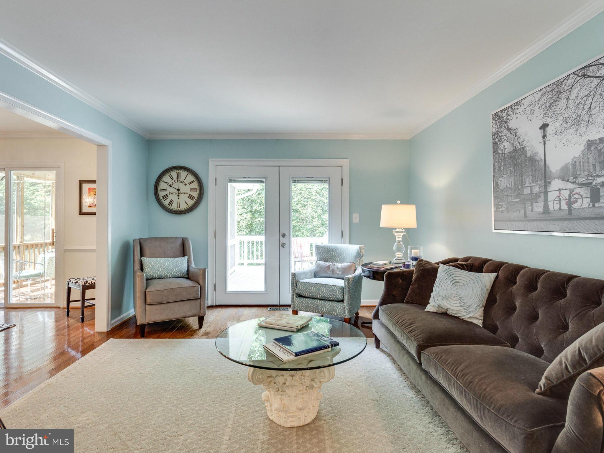 1802 Batten Hollow Road Vienna, VA 22182 - Photo 4 of 30 a living room with furniture and a large window