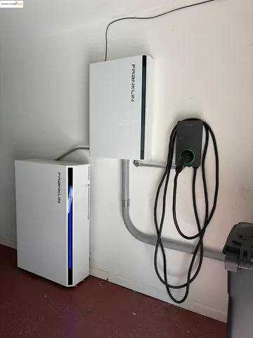 a living room with furniture a window and a fireplace