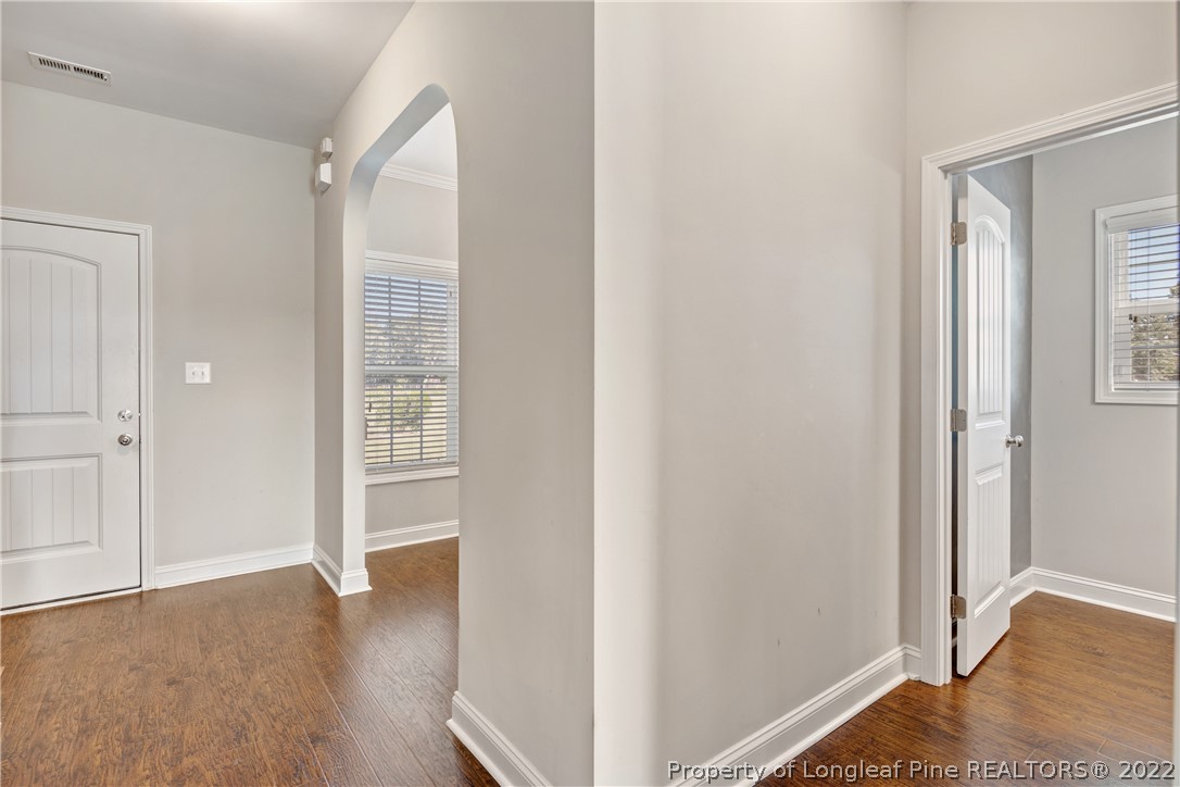 3700 Thrower Road Hope Mills, NC 28348 - Photo 7 of 37 a view of an empty room with wooden floor