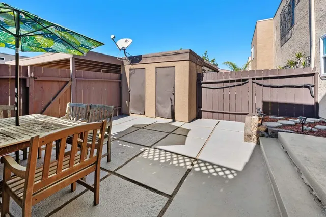 a building outdoor space with patio furniture