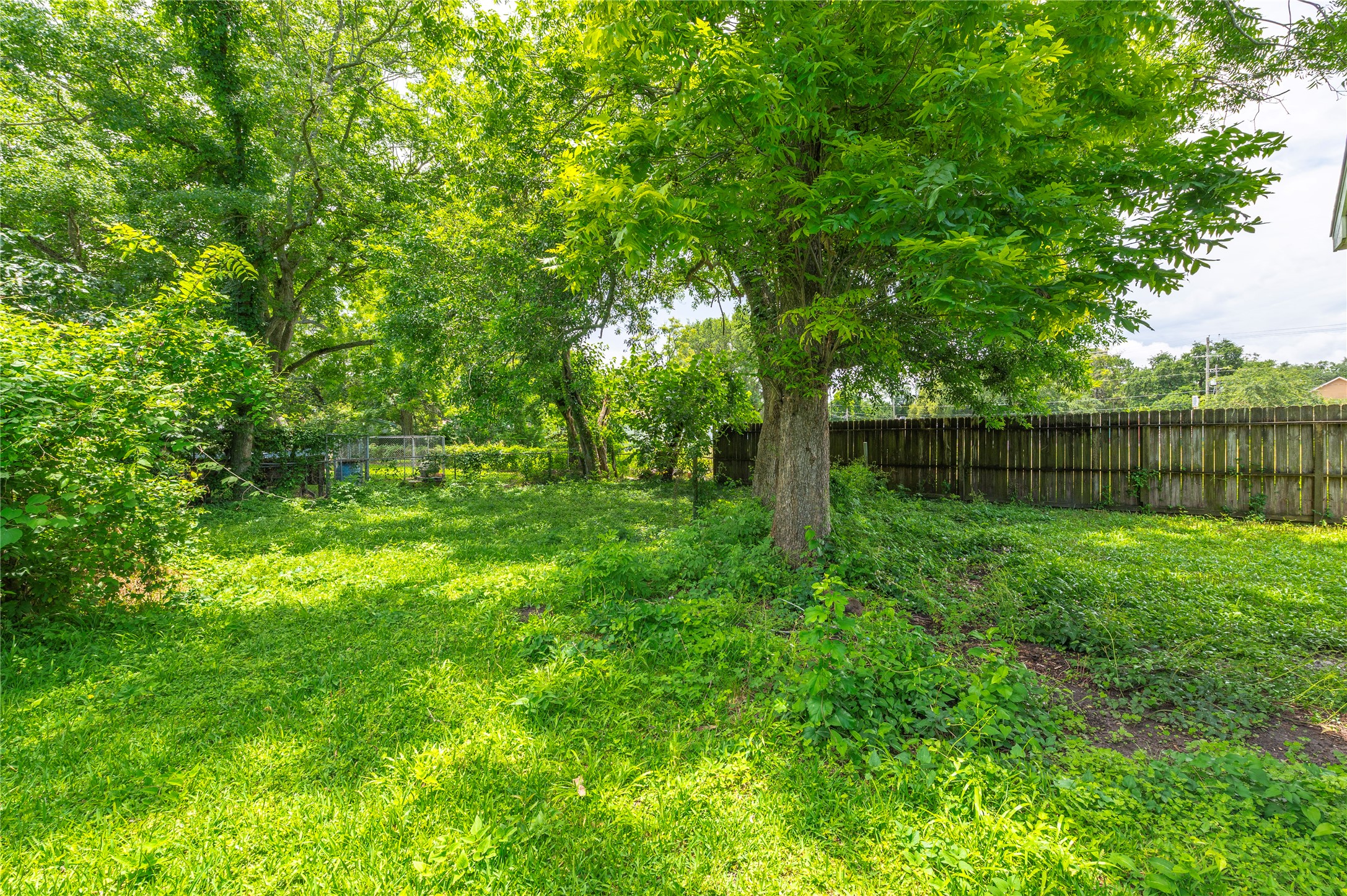 1125 Lake Road La Marque, TX 77568 - Photo 29 of 33 a view of outdoor space with deck and yard