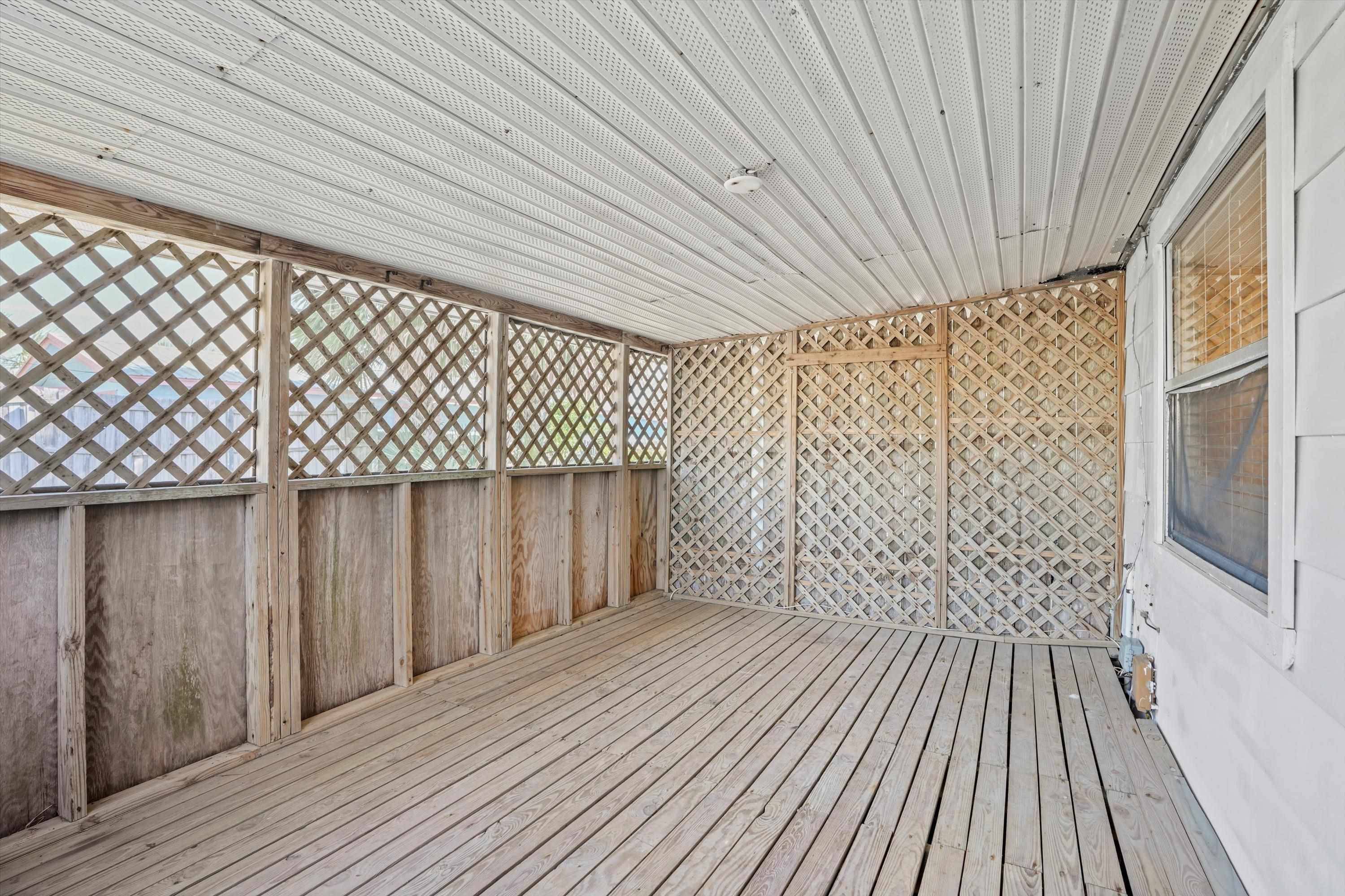 145 Gassett Road St. Augustine, FL 32080 - Photo 15 of 25 a view of a wooden deck