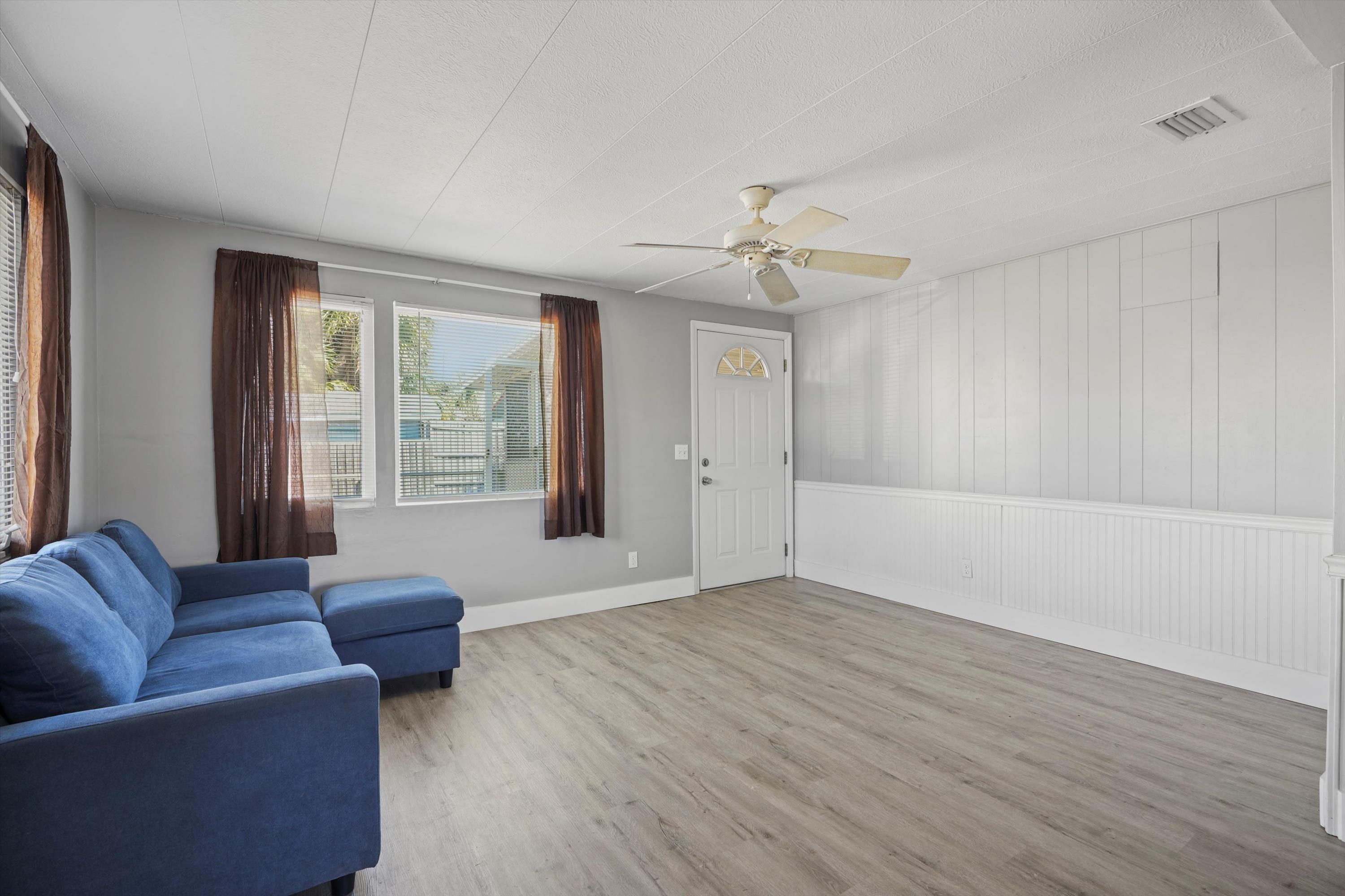 145 Gassett Road St. Augustine, FL 32080 - Photo 17 of 25 a living room with furniture and a large window