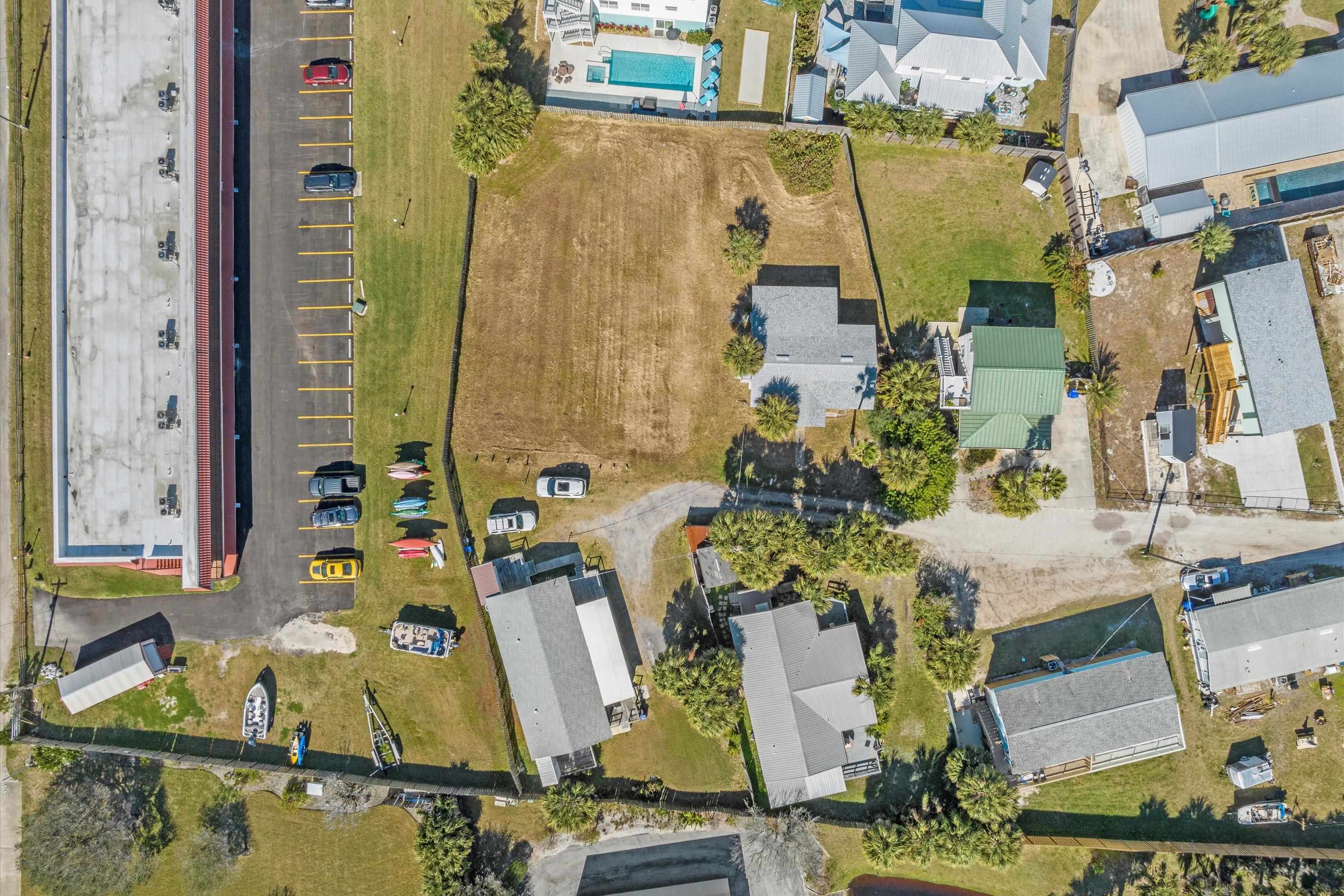 145 Gassett Road St. Augustine, FL 32080 - Photo 23 of 25 an aerial view of residential house with outdoor space and parking