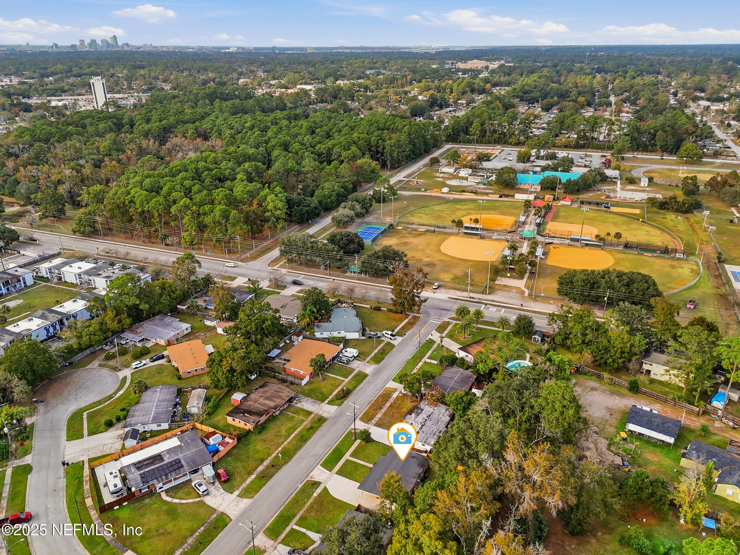 3135 Victoria Park Road Jacksonville, FL 32216 - Photo 19 of 21 an aerial view of residential houses with outdoor space and trees