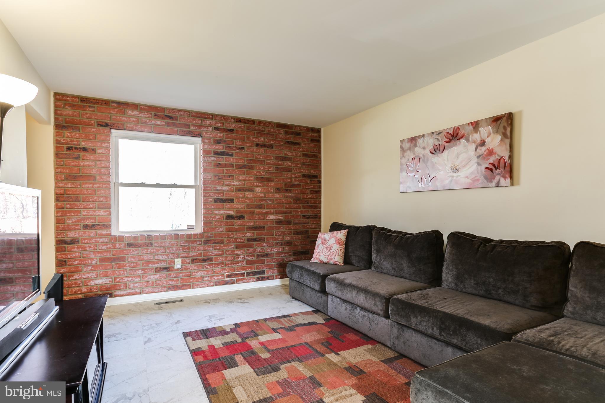 9003 Winands Road Owings Mills, MD 21117 - Photo 14 of 30 a living room with furniture and a rug