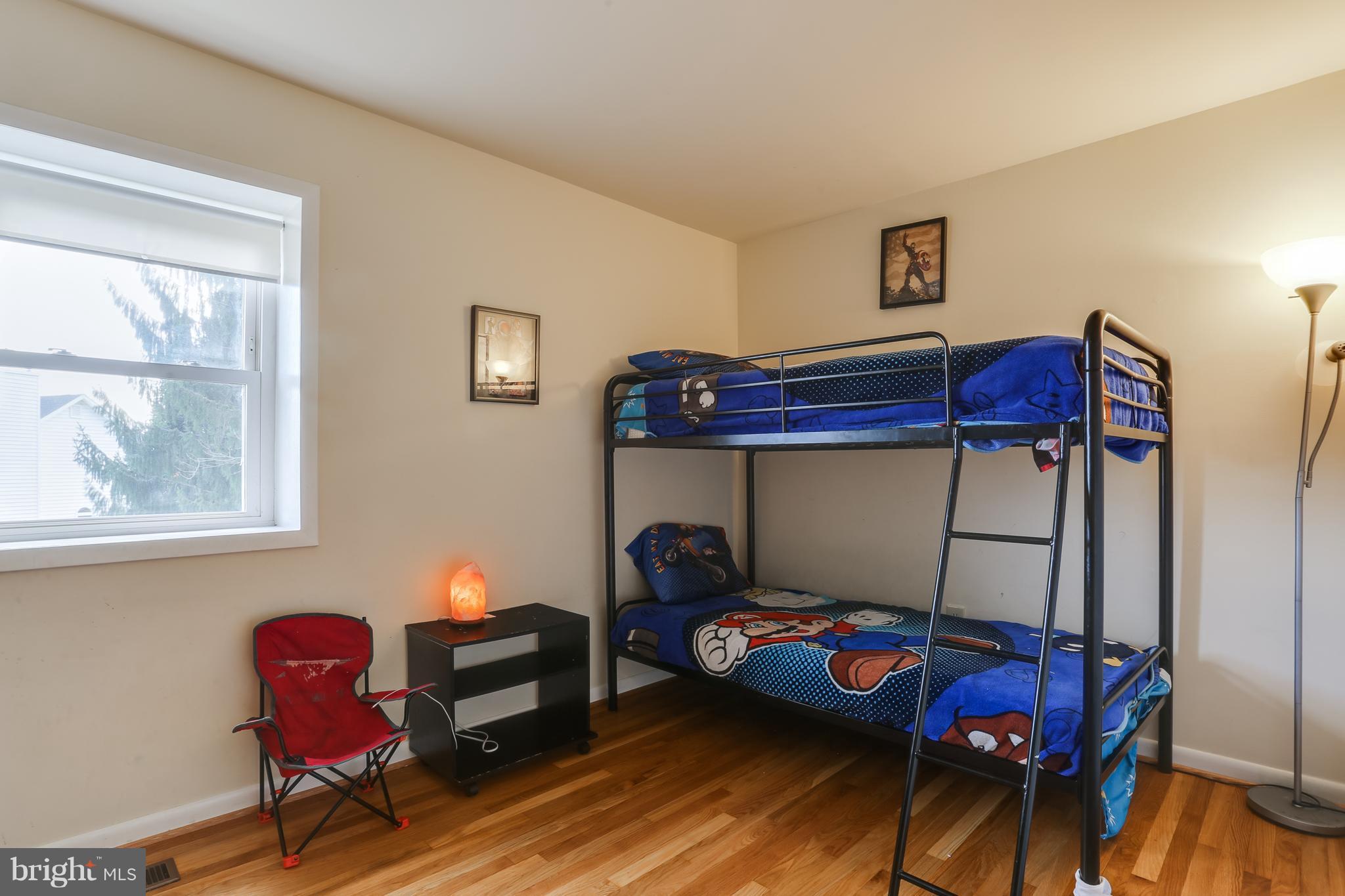 9003 Winands Road Owings Mills, MD 21117 - Photo 23 of 30 a bedroom with furniture and a window