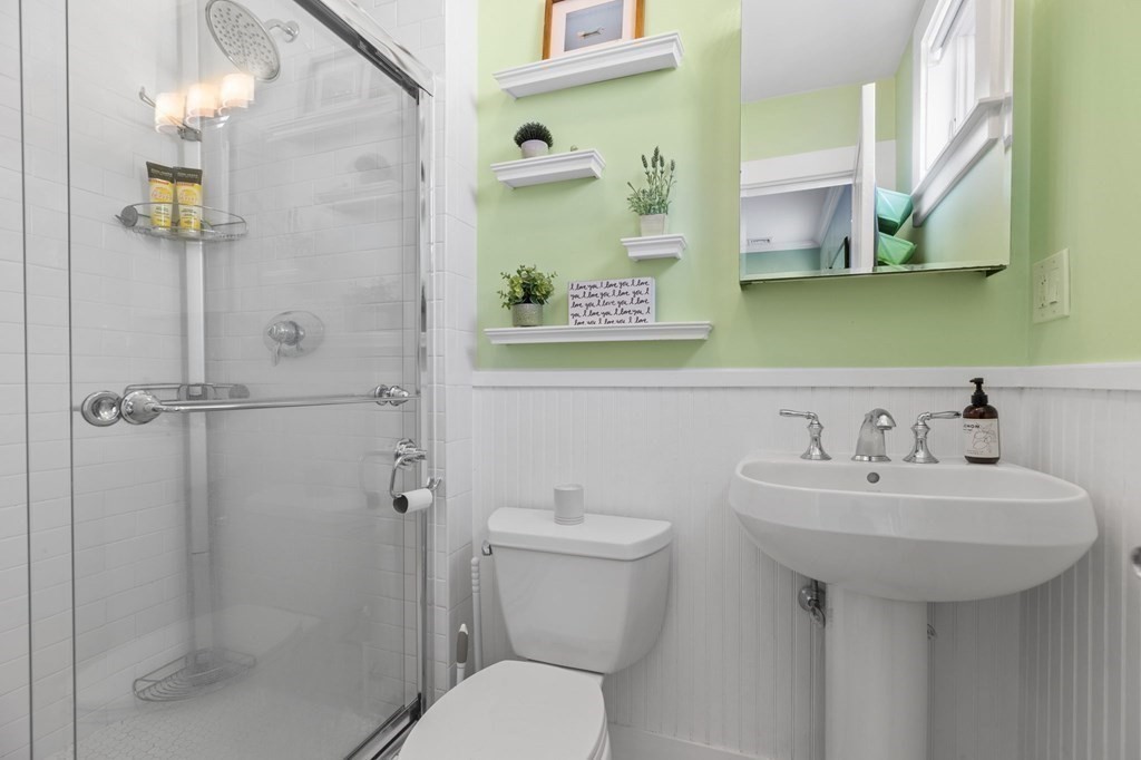 472 East 8th Street, Unit 2 Boston, MA 02127 - Photo 8 of 12 a bathroom with a sink toilet and shower