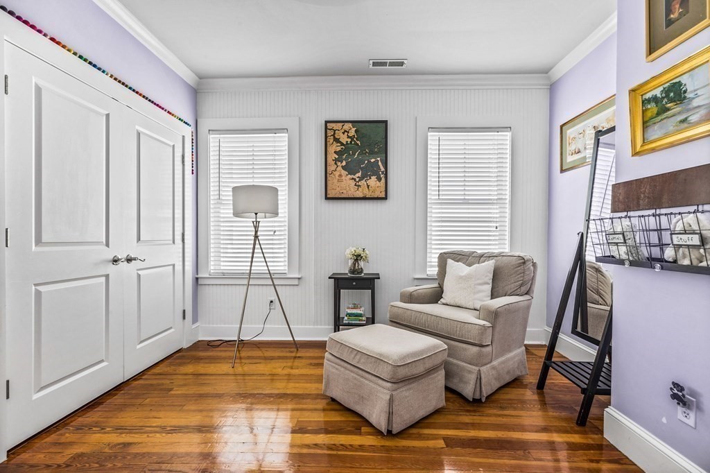 472 East 8th Street, Unit 2 Boston, MA 02127 - Photo 9 of 12 a living room with furniture and a table