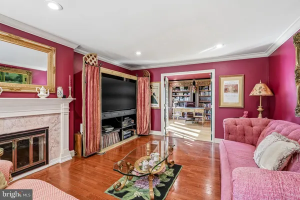 a kitchen with granite countertop kitchen island stainless steel appliances a sink and cabinets