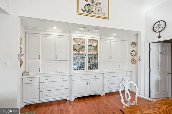 a view of walk in closet with clothes
