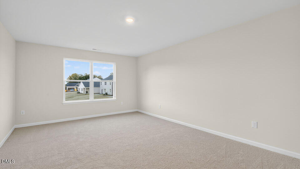 33 Stone Apiary Drive Angier, NC 27501 - Photo 19 of 45 an empty room with a window