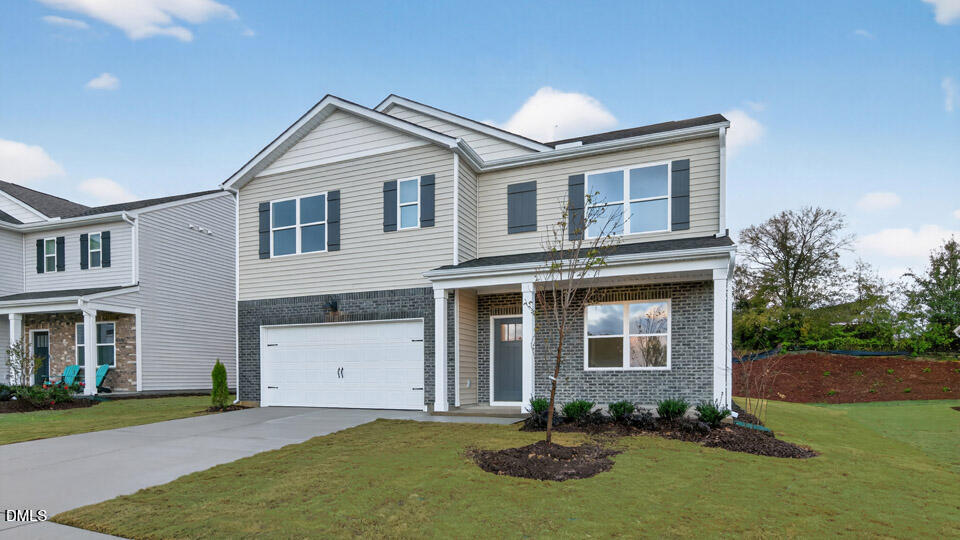 33 Stone Apiary Drive Angier, NC 27501 - Photo 2 of 45 a front view of a house with a yard