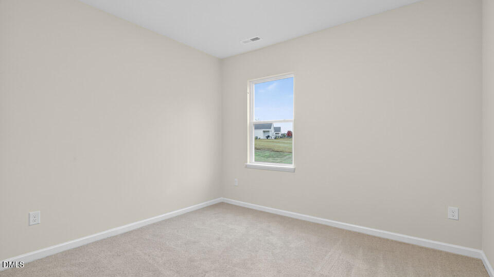 33 Stone Apiary Drive Angier, NC 27501 - Photo 24 of 45 an empty room with a window