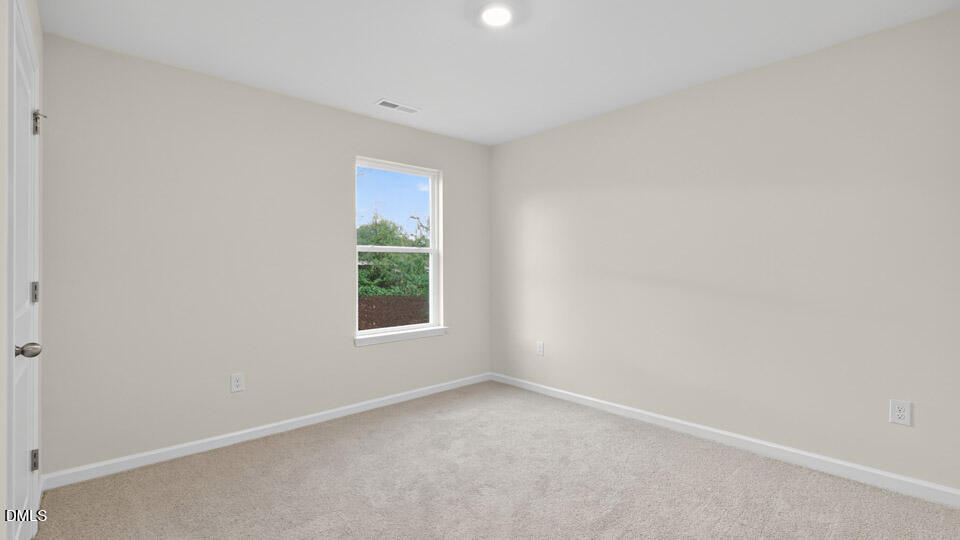33 Stone Apiary Drive Angier, NC 27501 - Photo 28 of 45 an empty room with a window