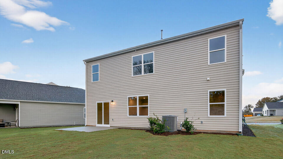 33 Stone Apiary Drive Angier, NC 27501 - Photo 36 of 45 a front view of a house with a garden