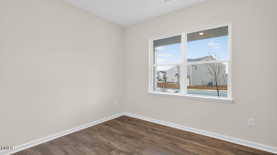 33 Stone Apiary Drive Angier, NC 27501 - Photo 6 of 45 an empty room with a window