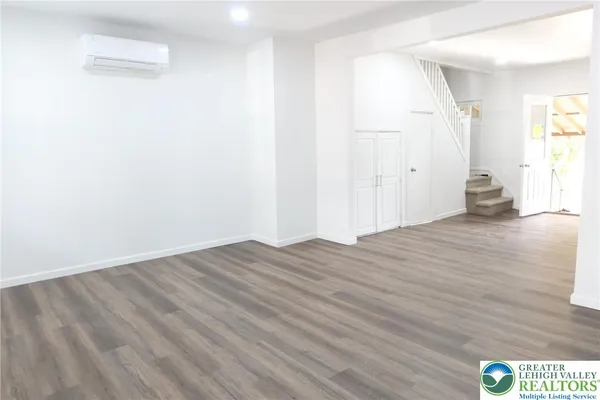 a view of an empty room and window