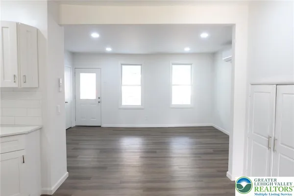 a view of an empty room and window
