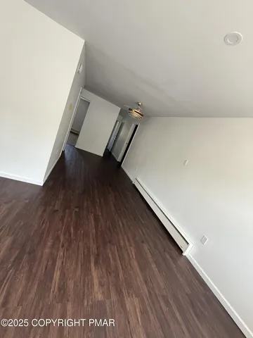 wooden floor with staircase