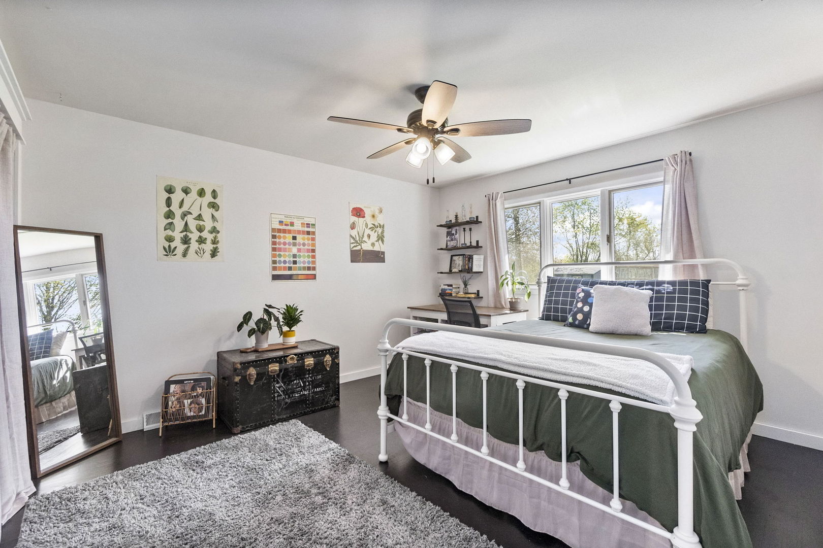 S888 Wenmoth Road Batavia, IL 60510 - Photo 15 of 40 a bedroom with a bed and a chandelier