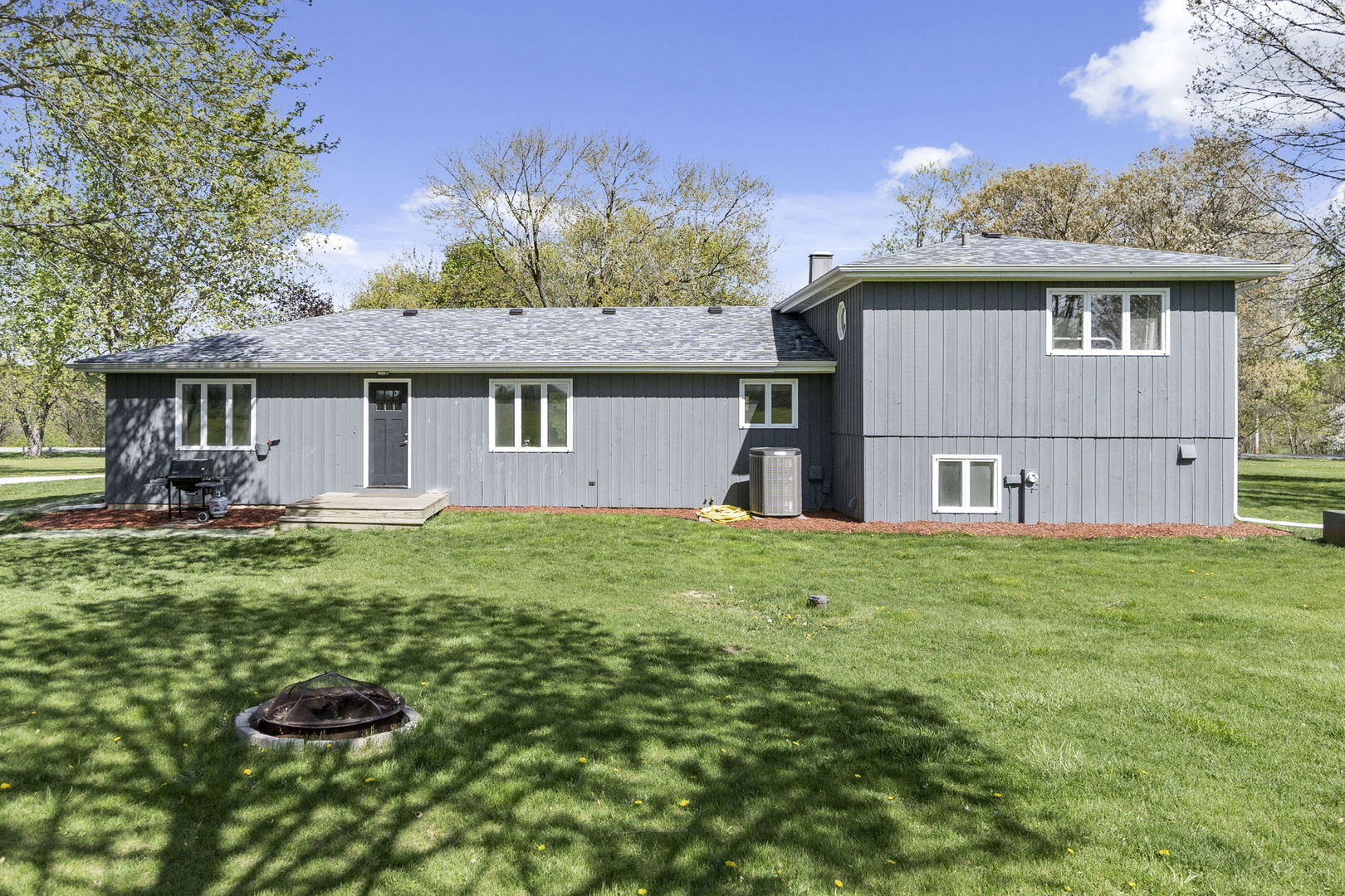 S888 Wenmoth Road Batavia, IL 60510 - Photo 24 of 40 a view of a house with backyard and garden