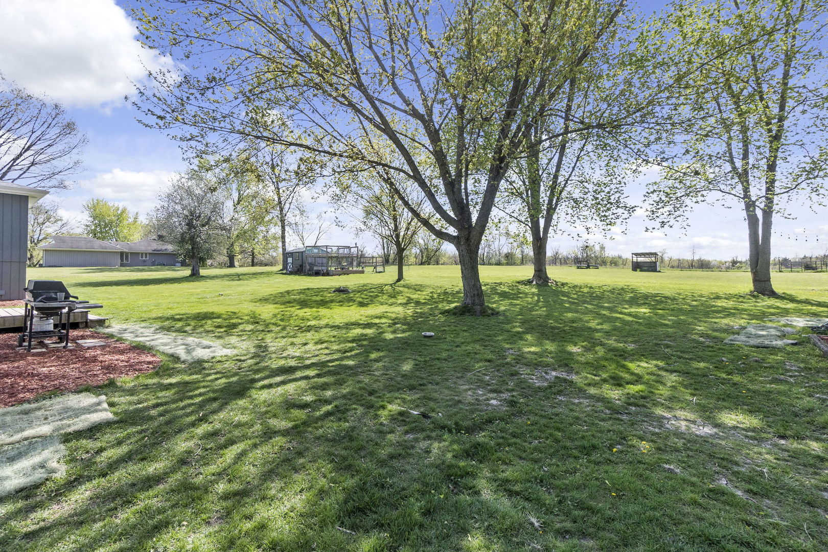 S888 Wenmoth Road Batavia, IL 60510 - Photo 40 of 40 a view of a backyard with large trees