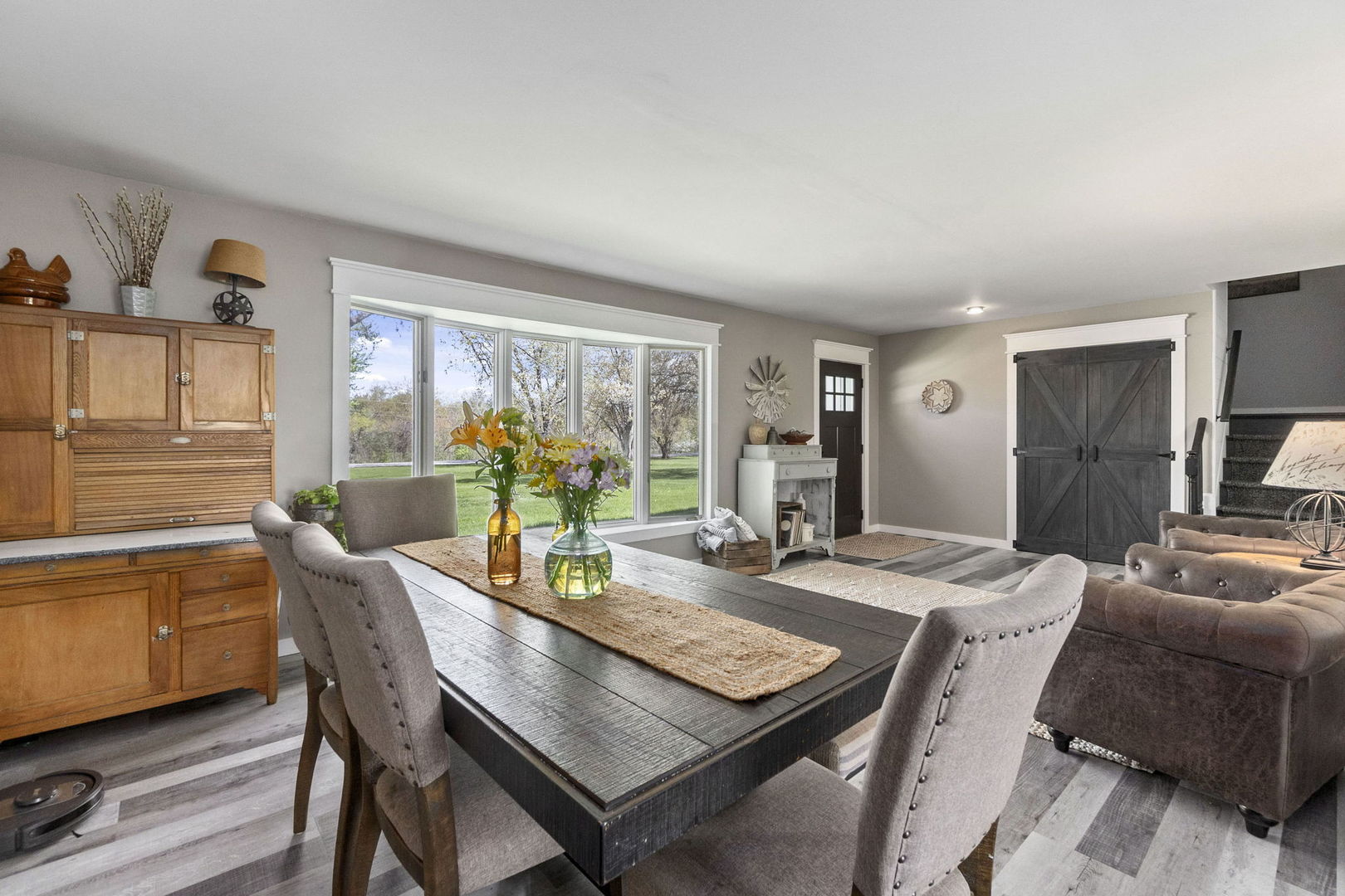S888 Wenmoth Road Batavia, IL 60510 - Photo 4 of 40 a view of a dining room with furniture window and outside view