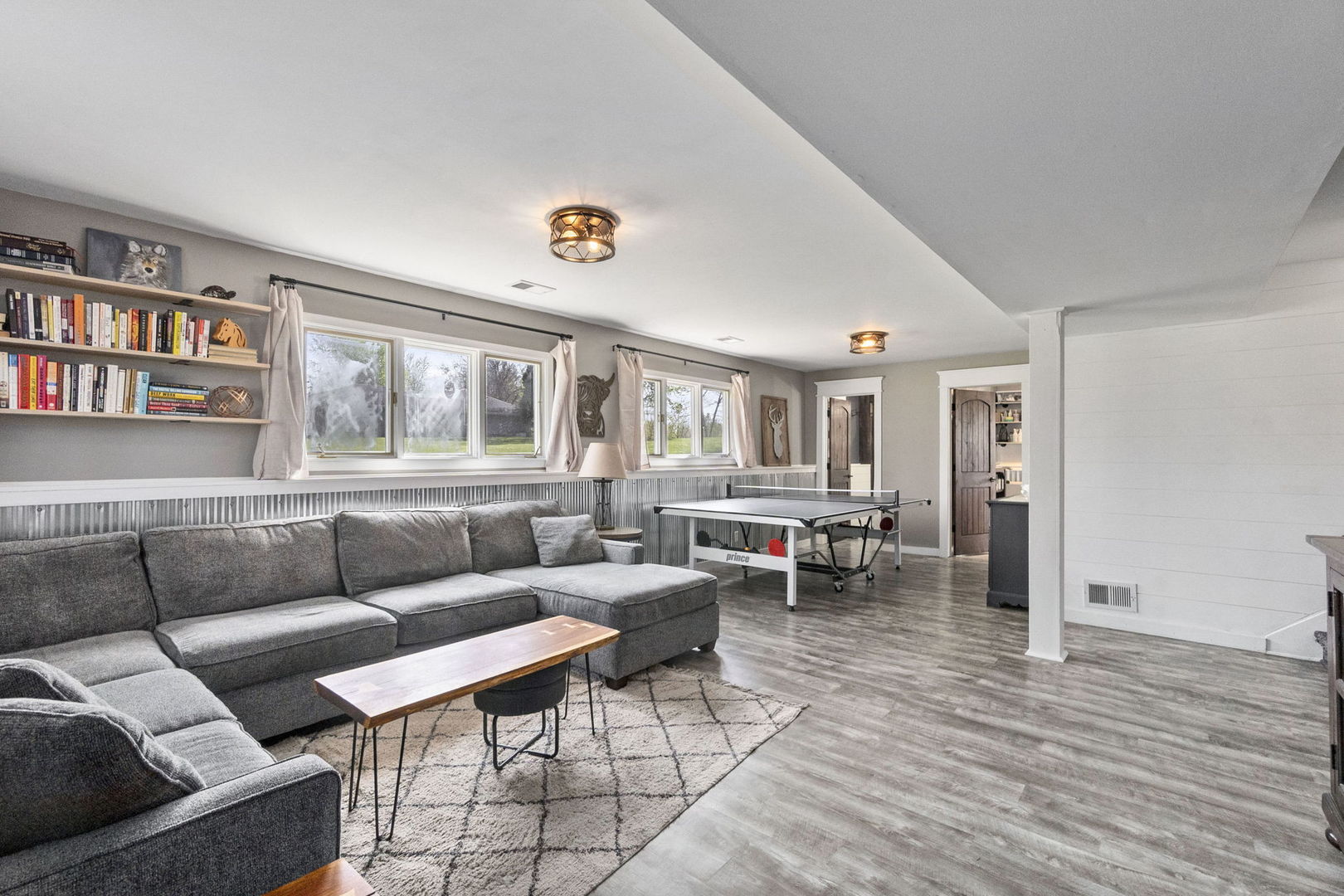 S888 Wenmoth Road Batavia, IL 60510 - Photo 10 of 40 a living room with furniture and a wooden floor