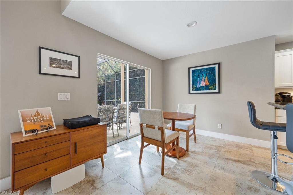 5188 Mabry Drive Naples, FL 34112 - Photo 18 of 49 a living room with furniture and a window