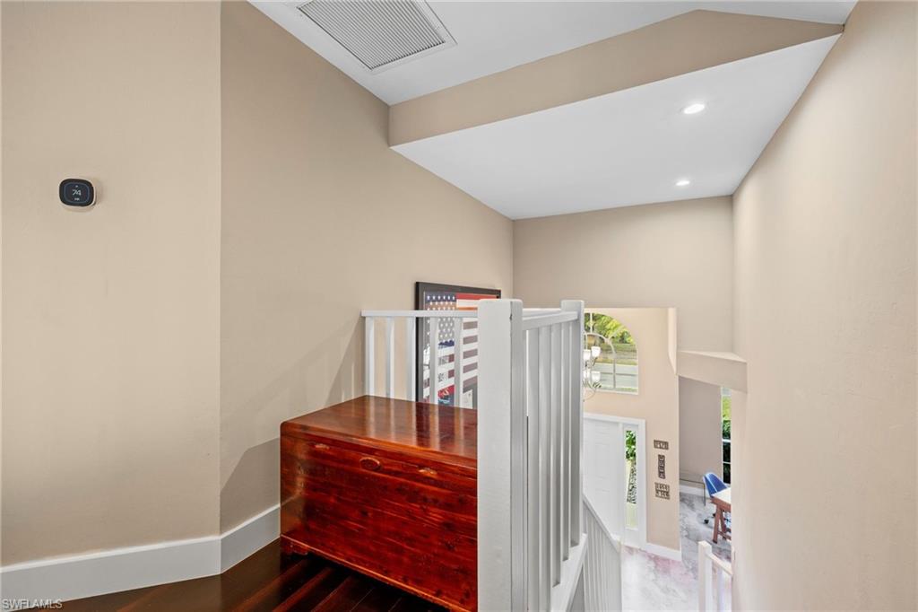 5188 Mabry Drive Naples, FL 34112 - Photo 24 of 49 a view of a hallway with workspace