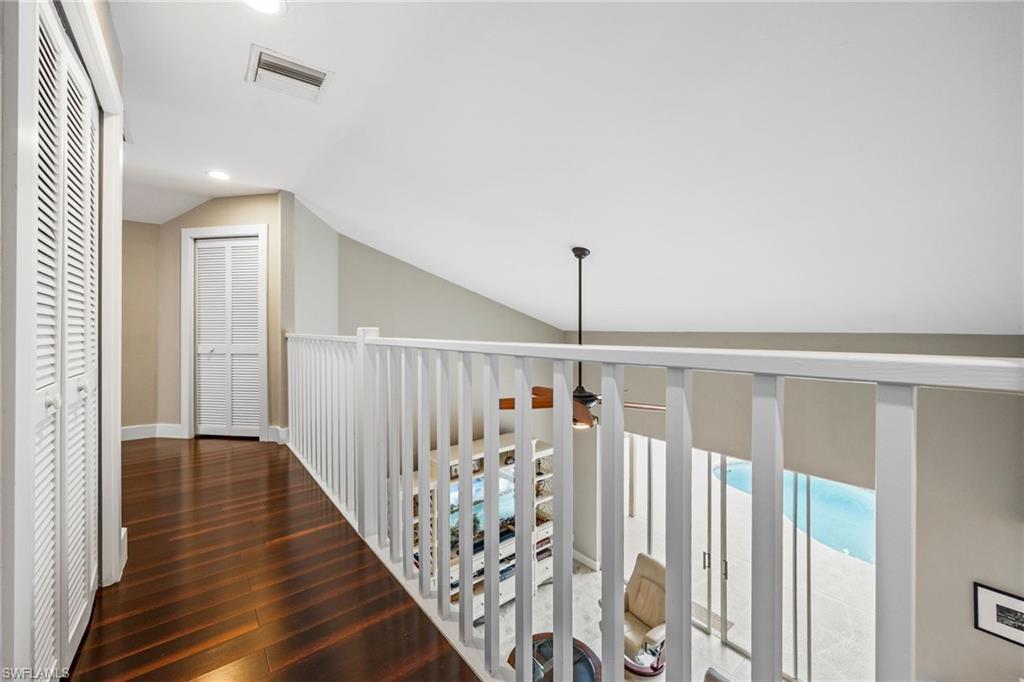 5188 Mabry Drive Naples, FL 34112 - Photo 25 of 49 a view of entryway with wooden floor