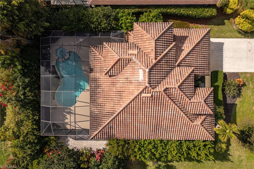 5188 Mabry Drive Naples, FL 34112 - Photo 38 of 49 a aerial view of a house with a garden