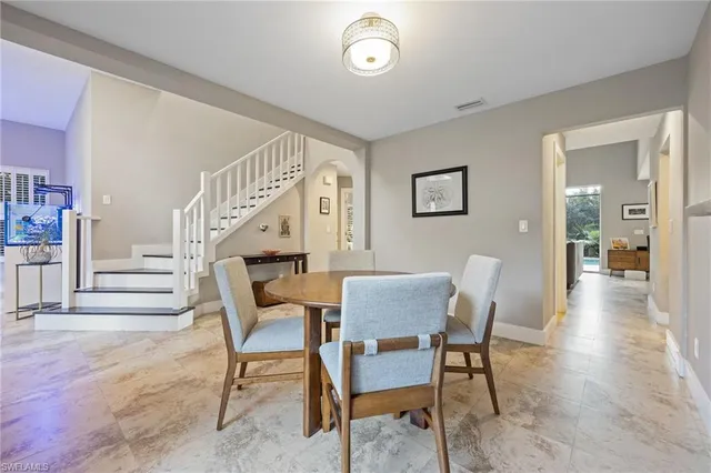 a view of a livingroom with furniture and wooden floor
