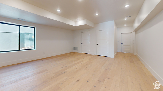 683 North Heritage Street Mapleton, UT 84664 - Photo 39 of 40 Unfurnished bedroom featuring light wood-type flooring and recessed lighting